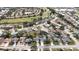 Aerial view of a residential neighborhood with houses, streets and trees at 1441 Strada D Oro, Venice, FL 34292