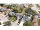 Aerial view of a single Gathering home with a large backyard and driveway at 1441 Strada D Oro, Venice, FL 34292