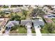 Aerial view of a single Gathering home with a large backyard and driveway at 1441 Strada D Oro, Venice, FL 34292