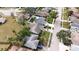 Aerial view of a single Gathering home with a large backyard and driveway at 1441 Strada D Oro, Venice, FL 34292