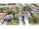Aerial view of a single Gathering home with a large backyard and driveway at 1441 Strada D Oro, Venice, FL 34292