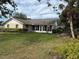 Ranch style home with screened porch and backyard at 1441 Strada D Oro, Venice, FL 34292
