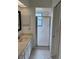 Clean bathroom with a walk-in shower and tile floor at 1441 Strada D Oro, Venice, FL 34292