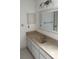Updated bathroom with vanity and mirror at 1441 Strada D Oro, Venice, FL 34292