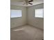 Bright bedroom with carpeted floor and ceiling fan at 1441 Strada D Oro, Venice, FL 34292
