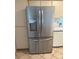 Stainless steel French door refrigerator with bottom freezer at 1441 Strada D Oro, Venice, FL 34292