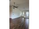 Living room with high ceiling and wood flooring at 1441 Strada D Oro, Venice, FL 34292