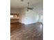 Spacious living room with high ceiling and wood flooring at 1441 Strada D Oro, Venice, FL 34292