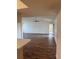 Spacious living room featuring hardwood floors and a ceiling fan at 1441 Strada D Oro, Venice, FL 34292