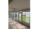 Sunroom with tiled floors and access to backyard at 1441 Strada D Oro, Venice, FL 34292