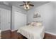 Well-lit bedroom with hardwood floors and double-door closet at 14448 Edna Cir, Port Charlotte, FL 33981