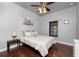 Bright bedroom with hardwood floors and ceiling fan at 14448 Edna Cir, Port Charlotte, FL 33981