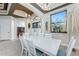 Spacious dining area with a white table and chairs near the entry at 14448 Edna Cir, Port Charlotte, FL 33981