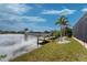 Private dock with covered seating area extending over the canal at 14448 Edna Cir, Port Charlotte, FL 33981