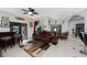 Relaxing Gathering room with leather seating and access to backyard patio at 14448 Edna Cir, Port Charlotte, FL 33981