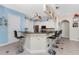 Modern kitchen with a breakfast bar and stainless steel appliances at 14448 Edna Cir, Port Charlotte, FL 33981