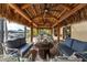 Relaxing lanai with firepit and comfortable seating at 14448 Edna Cir, Port Charlotte, FL 33981
