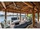 Spacious lanai with comfortable seating and stunning water views at 14448 Edna Cir, Port Charlotte, FL 33981