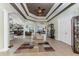 Bright and airy living room with tile floors and open concept design at 14448 Edna Cir, Port Charlotte, FL 33981