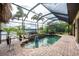 Inviting screened pool with a tranquil atmosphere at 14448 Edna Cir, Port Charlotte, FL 33981
