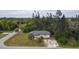 Aerial view of house, showing location and surrounding vegetation at 15120 Payne St, Punta Gorda, FL 33955