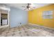 Bright bedroom with tiled floors and ceiling fan at 15120 Payne St, Punta Gorda, FL 33955