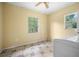 Laundry room with washer, dryer, and tile floor at 15120 Payne St, Punta Gorda, FL 33955