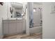 Bathroom with tub shower combination and updated vanity at 15361 Visalia Rd, Port Charlotte, FL 33981