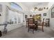 Casual dining area with wood table and chairs near window at 15361 Visalia Rd, Port Charlotte, FL 33981