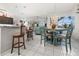 Kitchen with breakfast nook and large island at 15361 Visalia Rd, Port Charlotte, FL 33981