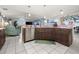 Modern kitchen with dark wood cabinets and granite countertops at 15361 Visalia Rd, Port Charlotte, FL 33981