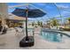 Inviting pool area with covered patio and lush landscaping at 15361 Visalia Rd, Port Charlotte, FL 33981
