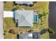 Bird's-eye view of a house with pool, located by the water at 162 Annapolis Ln, Rotonda West, FL 33947