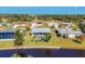 Aerial view of community with waterfront homes and pools at 162 Annapolis Ln, Rotonda West, FL 33947