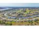Aerial view of community with canal and golf course at 162 Annapolis Ln, Rotonda West, FL 33947