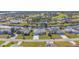 Aerial view of a canal-front home in a residential community at 162 Annapolis Ln, Rotonda West, FL 33947