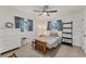 Cozy bedroom with a double bed and tile floors at 162 Annapolis Ln, Rotonda West, FL 33947