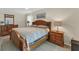Bedroom with wood furniture and tiled floors at 162 Annapolis Ln, Rotonda West, FL 33947