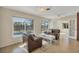 Relaxing Gathering room with canal views and leather furniture at 162 Annapolis Ln, Rotonda West, FL 33947