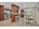 Eat-in kitchen with island, stainless steel appliances, and tile floor at 162 Annapolis Ln, Rotonda West, FL 33947