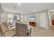 Living room with neutral tones, tile floors and recessed lighting at 162 Annapolis Ln, Rotonda West, FL 33947