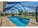 Inviting screened-in pool with tranquil water at 162 Annapolis Ln, Rotonda West, FL 33947