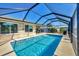Sparkling, refreshing pool with screened enclosure at 162 Annapolis Ln, Rotonda West, FL 33947