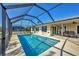 Relaxing pool and patio with canal views at 162 Annapolis Ln, Rotonda West, FL 33947