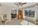 Bright sunroom with canal view and built-in shelving at 162 Annapolis Ln, Rotonda West, FL 33947