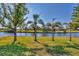 Scenic view of canal and lush vegetation from the backyard at 162 Annapolis Ln, Rotonda West, FL 33947