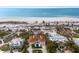 Aerial view of beachfront property with pool at 16271 N Island Ct, Boca Grande, FL 33921