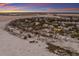 Wide shot of beachfront homes and tranquil ocean at 16271 N Island Ct, Boca Grande, FL 33921