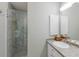 Bathroom with a shower and a tiled floor at 16271 N Island Ct, Boca Grande, FL 33921