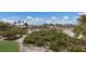 View of beach with boardwalk and vegetation at 16271 N Island Ct, Boca Grande, FL 33921